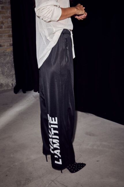 Haute L'Amitié Slim logo track tall pants